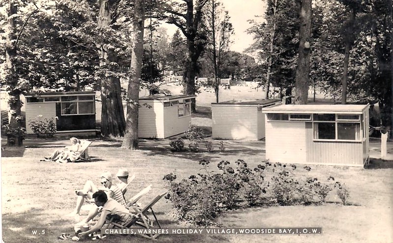 postcard of Warner's woodside bay holiday camp showing the chalets