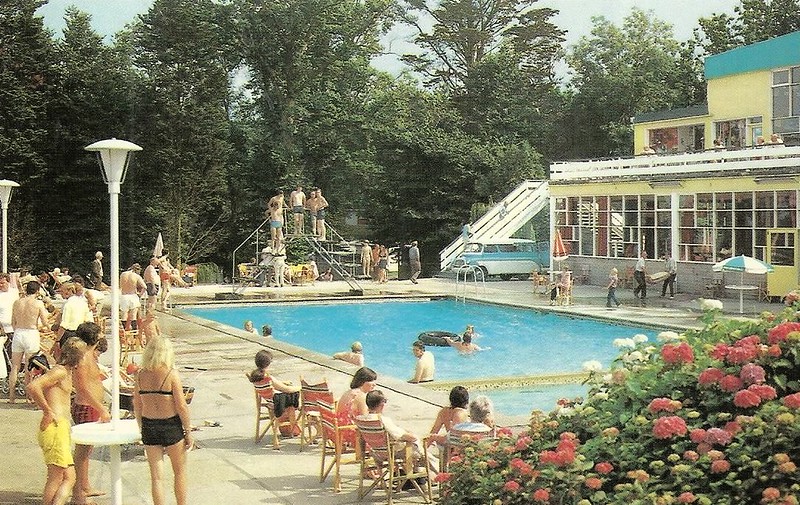 postcard of Warner's woodside bay holiday camp showing the swimming pool