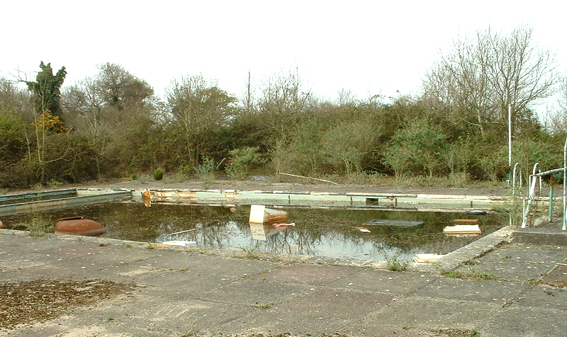 derelict remains of Warner's woodside bay holiday camp showing the outside swimming pool