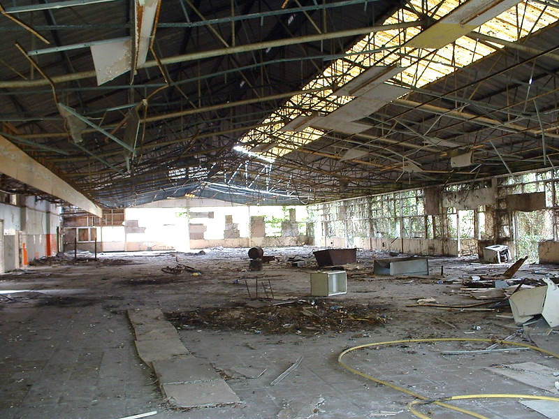 derelict remains of Warner's woodside bay holiday camp showing the dining hall interior