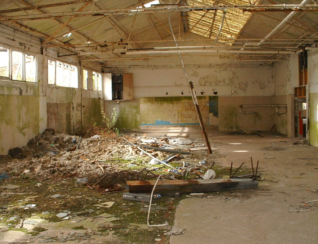 derelict remains of Warner's woodside bay holiday camp showing the interior of the kitchen