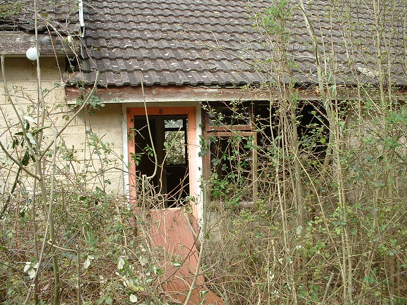 derelict remains of Warner's woodside bay holiday camp showing one of the old chalets