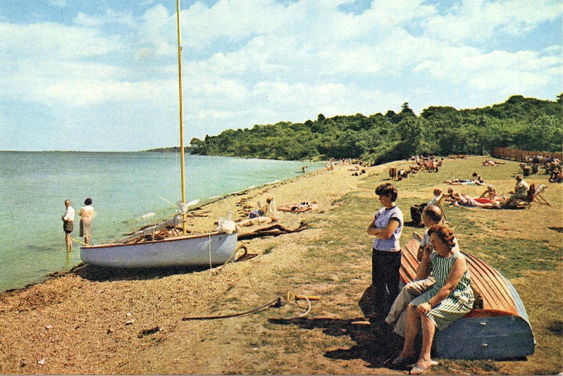 postcard of Warner's woodside bay holiday camp showing the beach