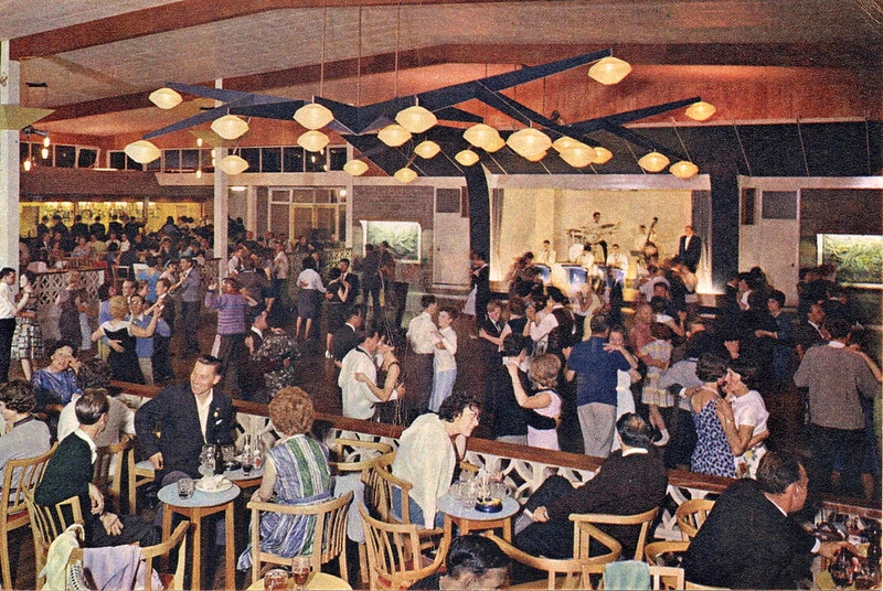 postcard of Warner's woodside bay holiday camp showing the interior of the ballroom