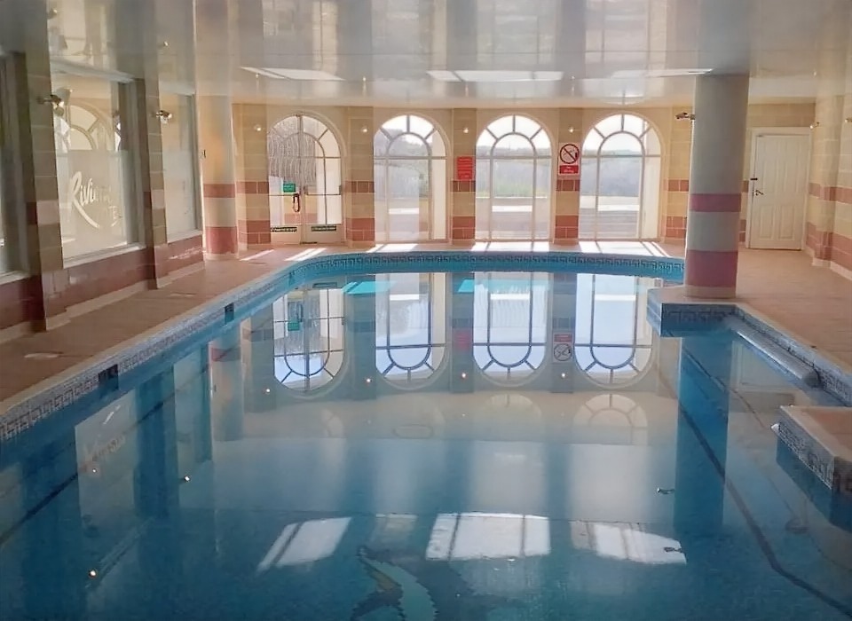 Riviera Hotel, Bowleaze Cove, near Weymouth after refurbishment showing the indoor swimming pool