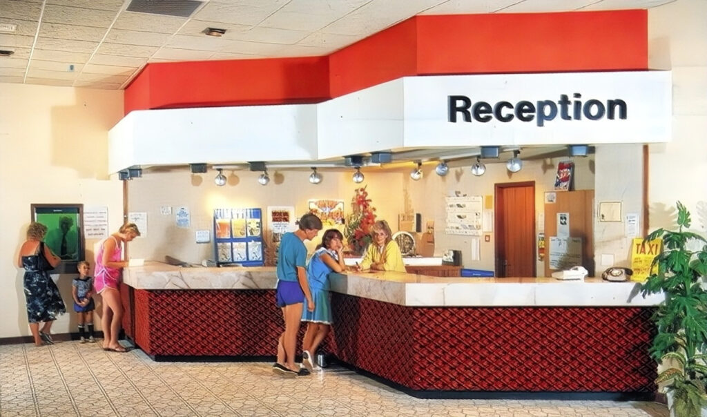 1980s photo of St Mary's Bay Holiday Camp, Brixham showing the reception